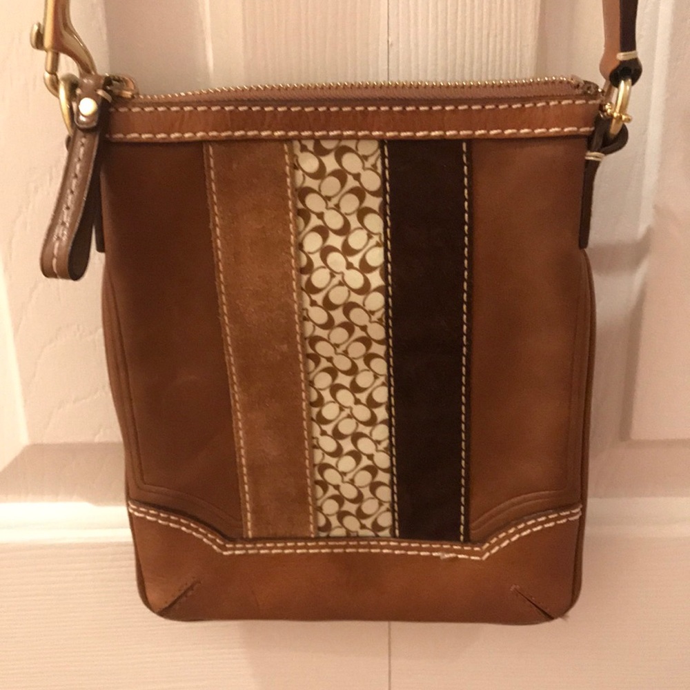 Brown leather Coach cross body bag.